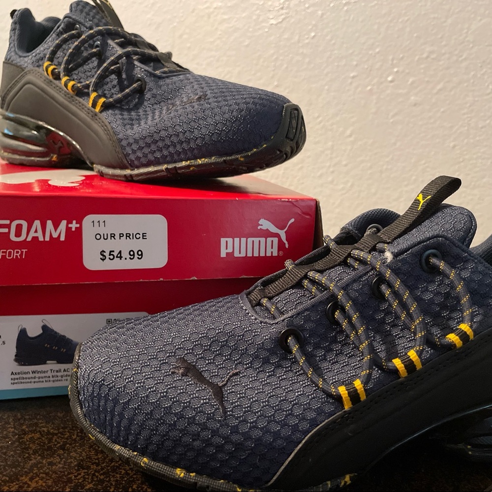 Puma sneakers 3.5 boys my 8 year old never wore these also never been stepped in